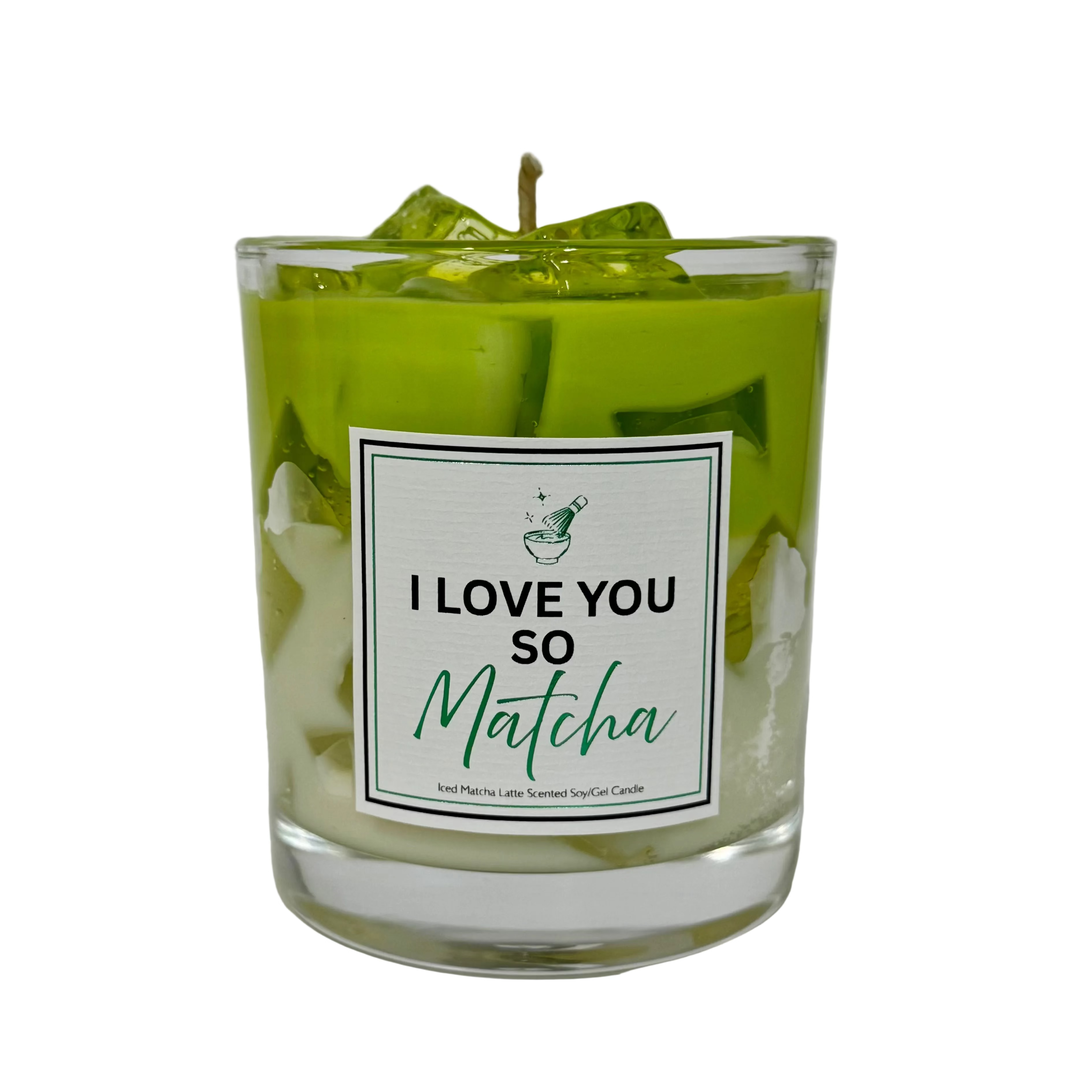 Green candle in a glass jar with a label reading 'I Love You So Matcha' on a white background